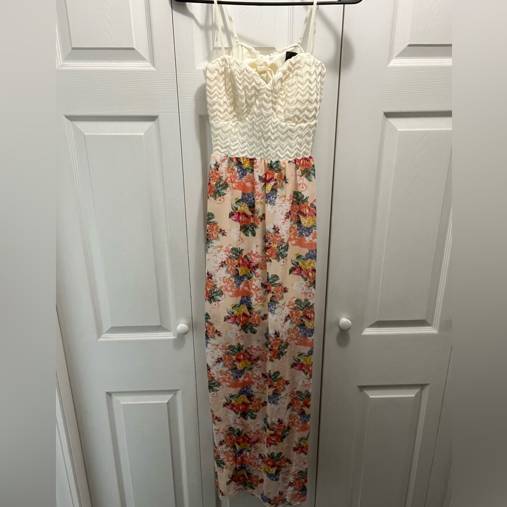 Medium Trixxi beach dress with open back.